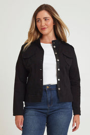 Model Chanel wearing size XL of the Military Denim Jacket in colour Black (Black), from the front, cropped image