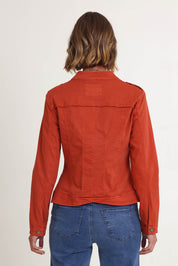 Model Riina wearing size S of the Military Denim Jacket in colour Maple, from the back