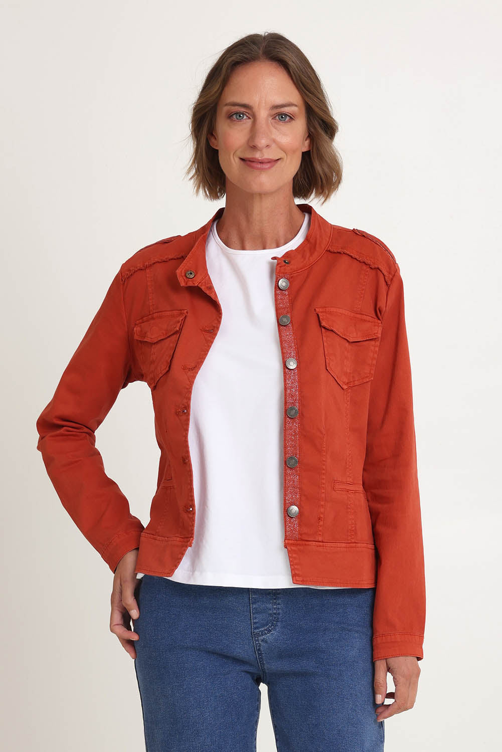 Model Riina wearing size S of the Military Denim Jacket in colour Maple, from the front, cropped image