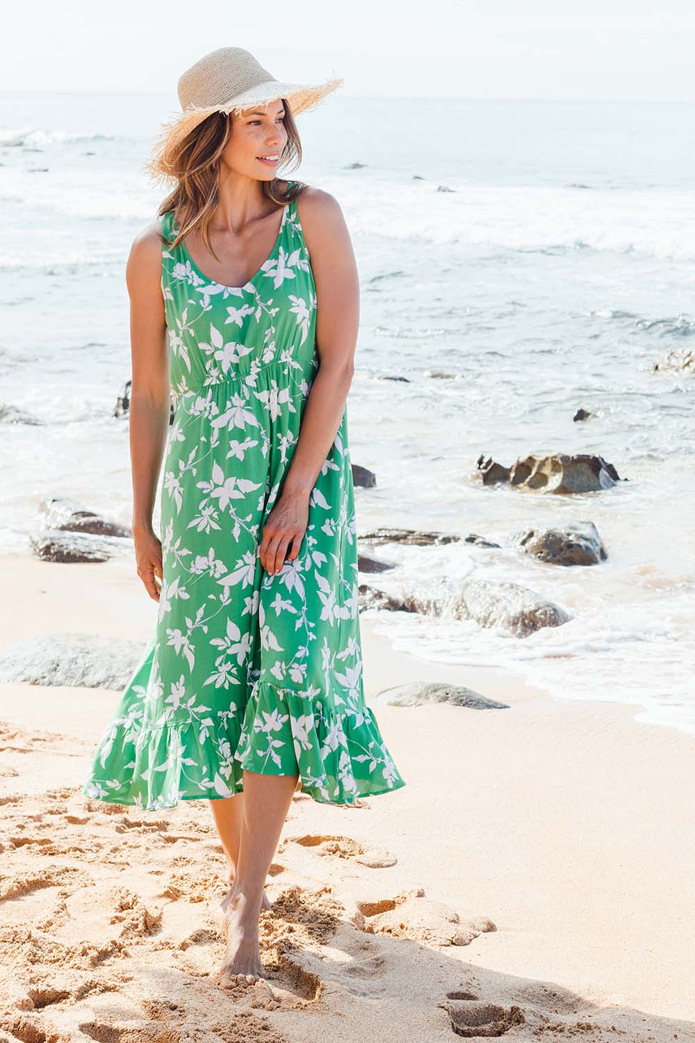 Model Amanda wearing size S of the Floral Print Sun Dress in colour Green (Green), from the front, showing the whole outfit
