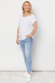 A model wearing the Star Print Top in colour White (White), from the front, showing the whole outfit