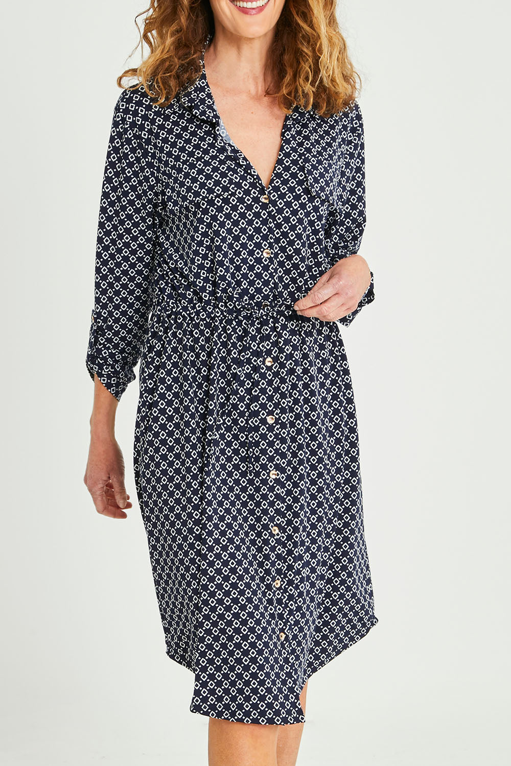 Model Emma wearing size S of the Alexa Dress in colour Navy (Blue), from the front, cropped image