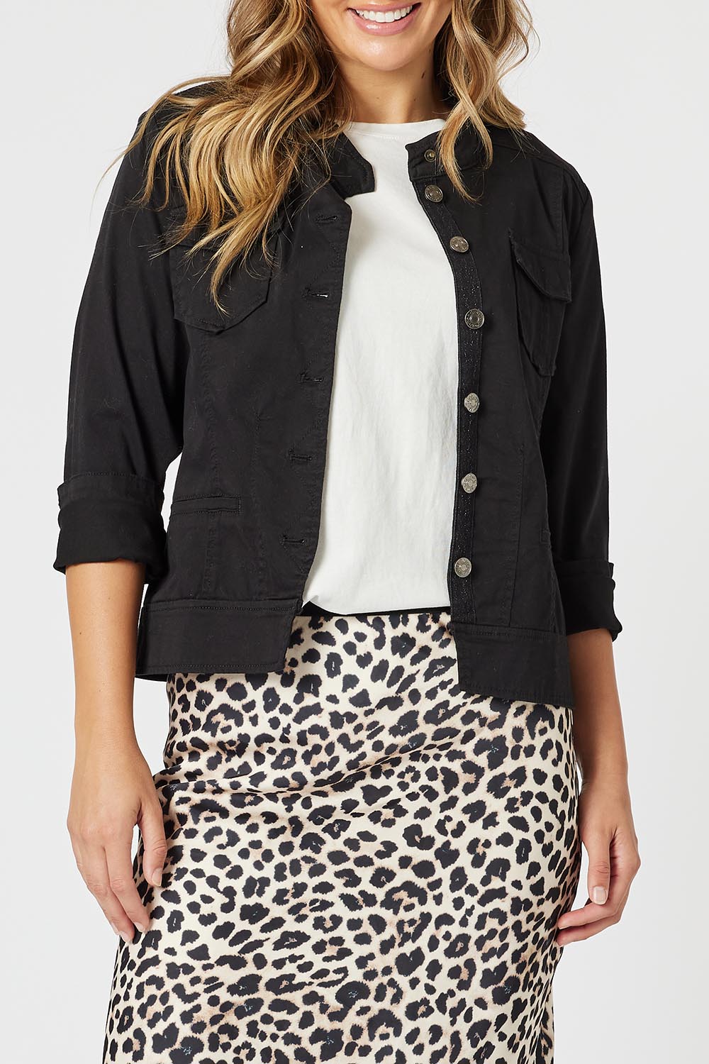 A model wearing the Maggie Denim Jacket in colour Black (Black), from the front, cropped image