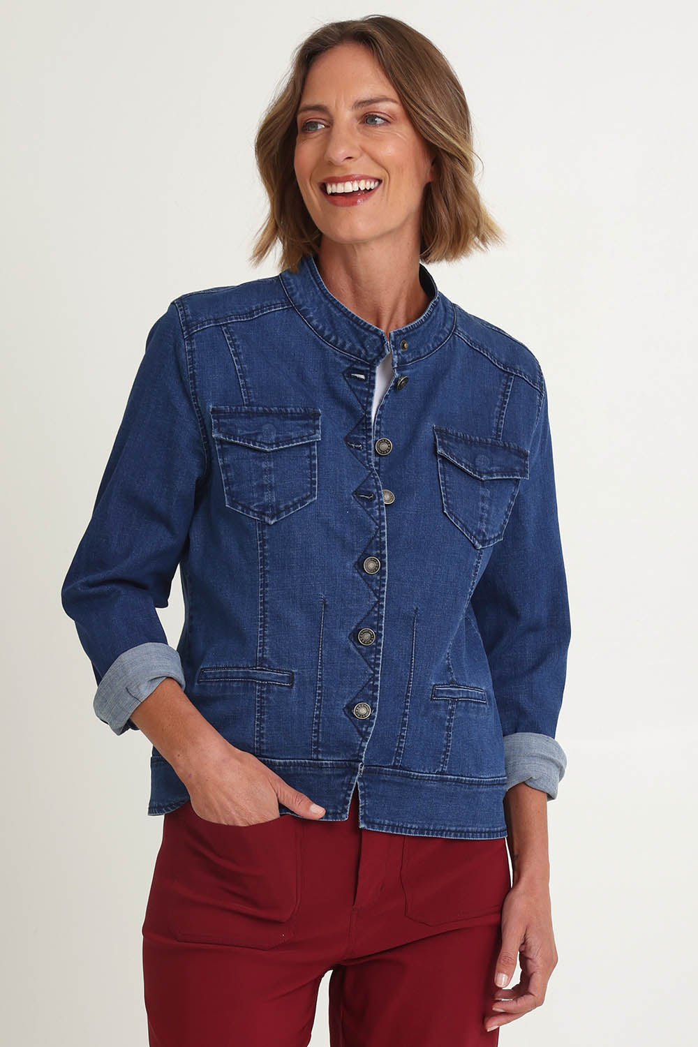 Model Riina wearing size S of the Maggie Denim Jacket in colour Darkdenim (Blue), from the front, cropped image