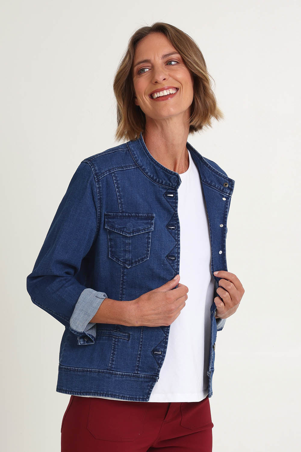 Model Riina wearing size S of the Maggie Denim Jacket in colour Darkdenim (Blue), from the front, cropped image