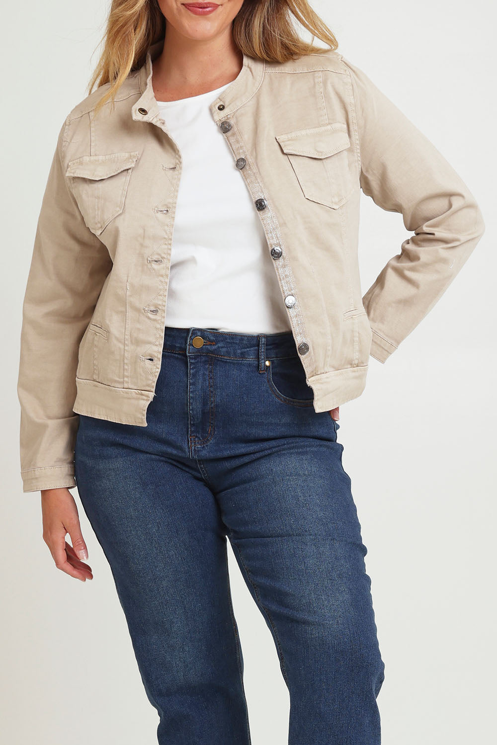 Model Chanel wearing size XL of the Maggie Denim Jacket in colour Natural, from the front, cropped image