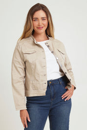 Model Chanel wearing size XL of the Maggie Denim Jacket in colour Natural, from the front, cropped image