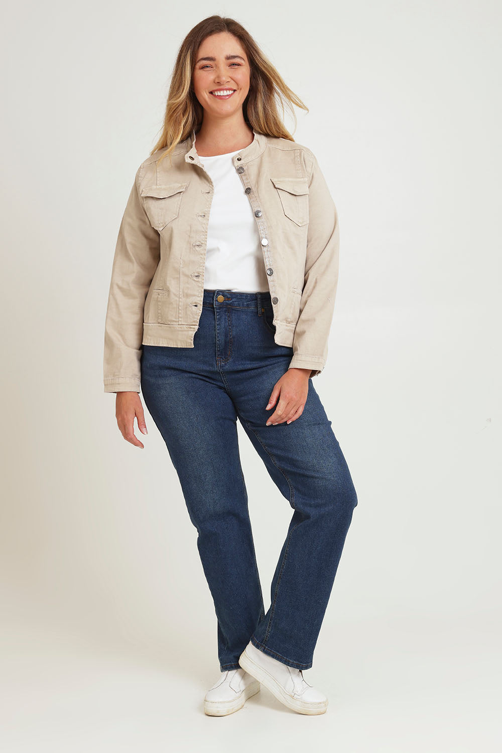 Model Chanel wearing size XL of the Maggie Denim Jacket in colour Natural, from the front, showing the whole outfit