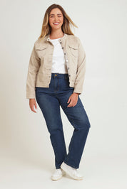 Model Chanel wearing size XL of the Maggie Denim Jacket in colour Natural, from the front, showing the whole outfit