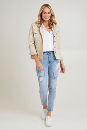 Model Grace wearing size S of the Maggie Denim Jacket in colour Natural, from the front, showing the whole outfit
