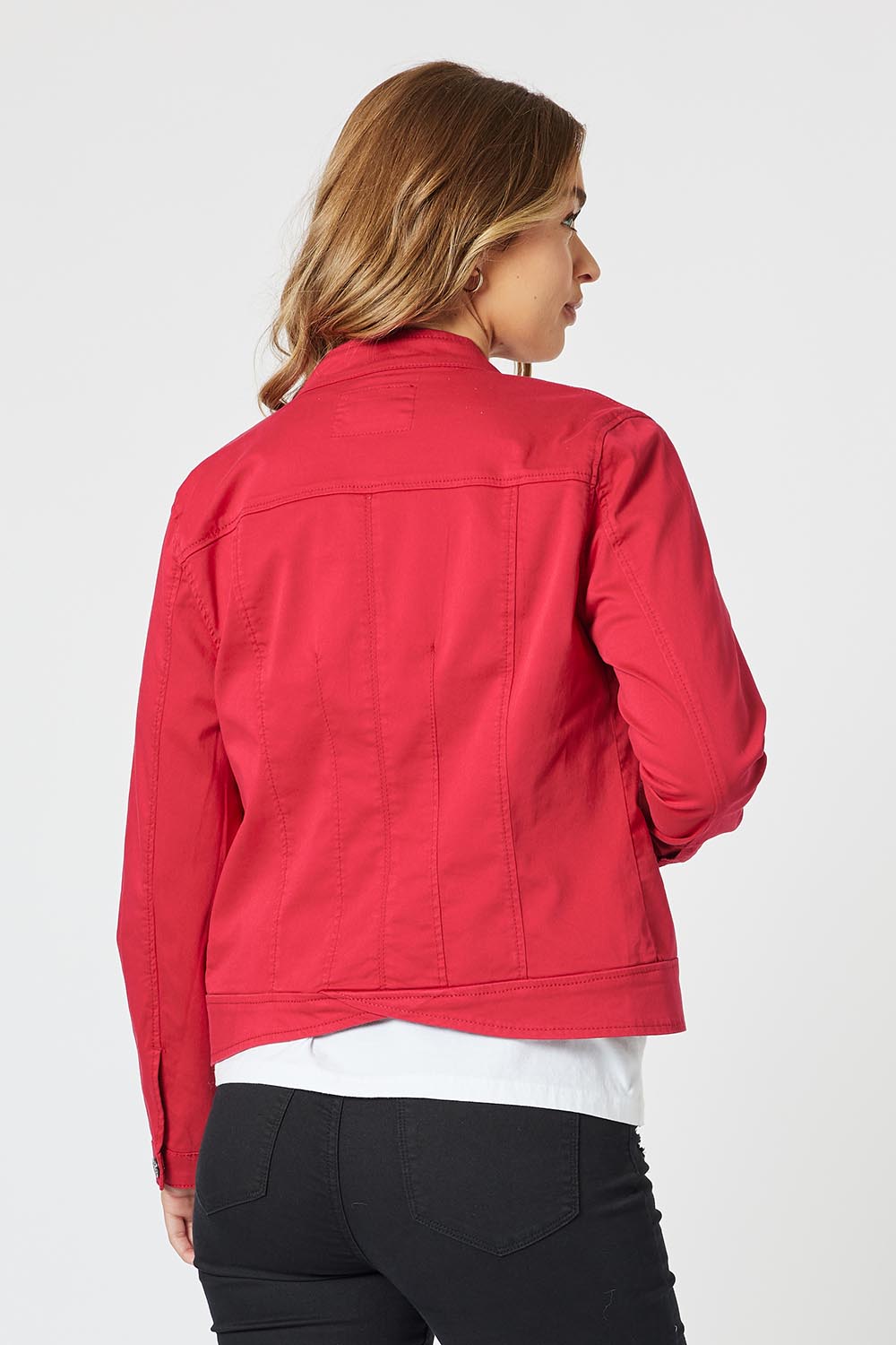 A model wearing the Maggie Denim Jacket in colour Red (Red), from the back