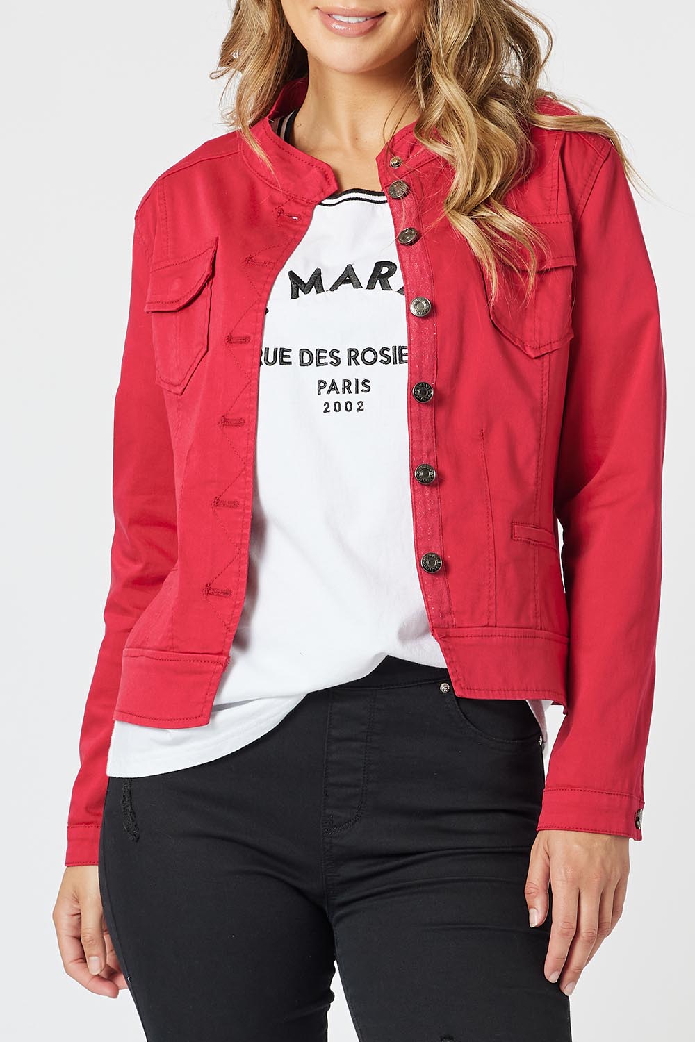 A model wearing the Maggie Denim Jacket in colour Red (Red), from the front, cropped image