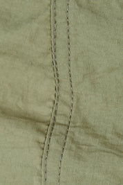 Product shot of the Long Travel Jacket in colour Khaki (Green), detail