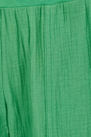 Product shot of the Byron Cotton 7/8 Pant in colour Emerald (Green), detail