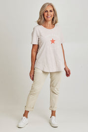 Model Sandy wearing size S of the C'est La Vie Cotton Tee in colour Natural, from the front, showing the whole outfit