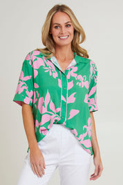Model Grace wearing size S of the Spring Shirt in colour Emerald (Green), from the front, cropped image