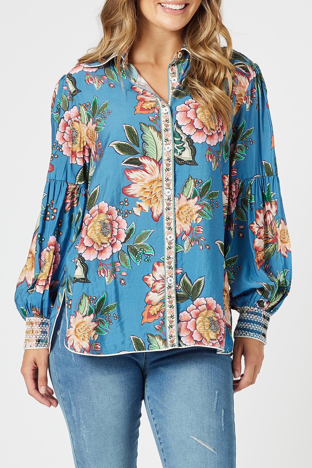 A model wearing the Vintage Rose Shirt in colour Multi (Blue), from the front, cropped image