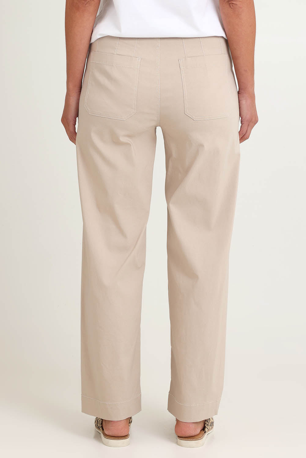 Model Riina wearing size S of The Marine Wide Leg Pant in colour Natural, from the back