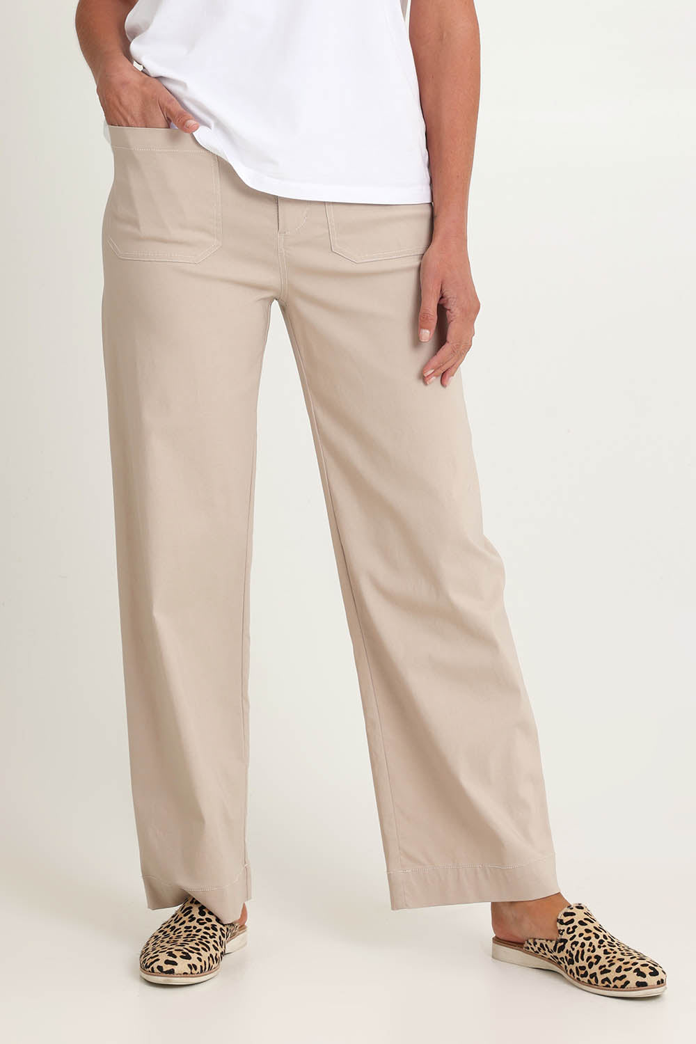 Model Riina wearing size S of The Marine Wide Leg Pant in colour Natural, from the front, cropped image