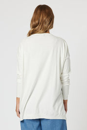A model wearing the La Paris Knit Jumper in colour White (White), from the back
