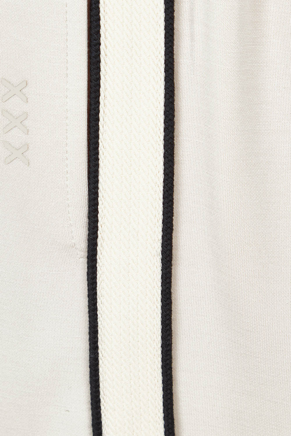 Product shot of the Urban Crop Pant in colour Chalk, detail