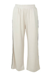 Product shot of the Urban Crop Pant in colour Chalk, from the front