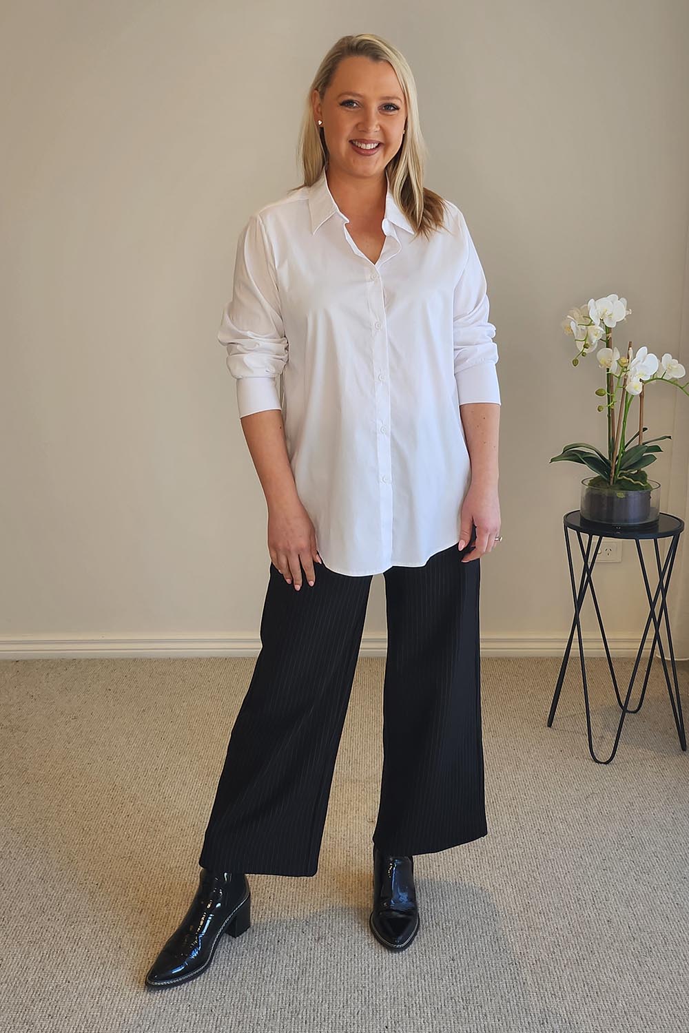 A model wearing the City Rib Cuff Cotton Blend Shirt in colour White (White), from the front, showing the whole outfit