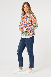A model wearing the Rio Top in colour Multi (Pink), from the front, showing the whole outfit