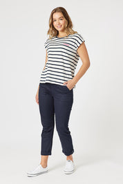 A model wearing the Amour Stripe Cotton Tee in colour Navy (Blue), from the front, showing the whole outfit