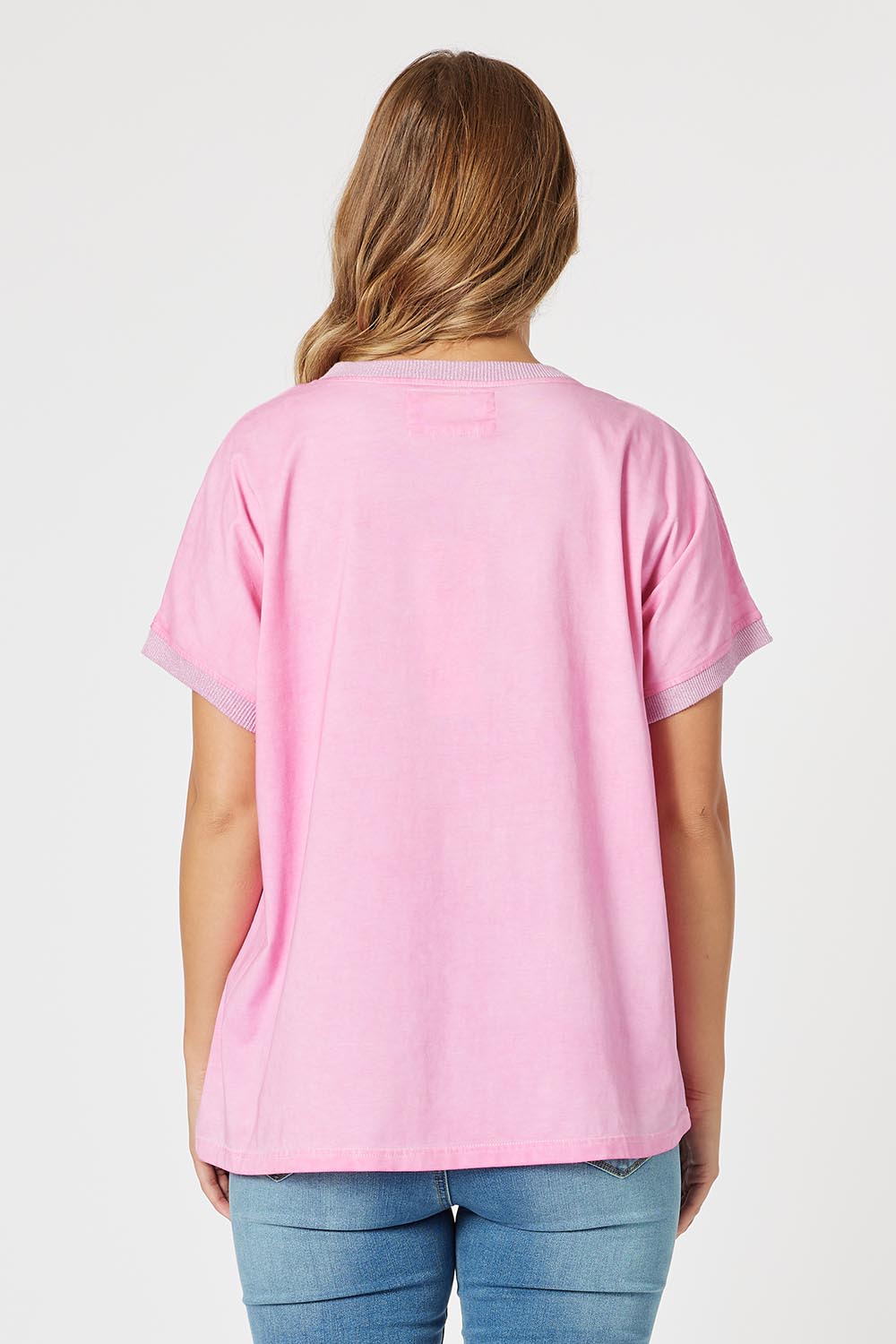 A model wearing The Sienna Linen Blend Tee in colour Pink (Pink), from the back