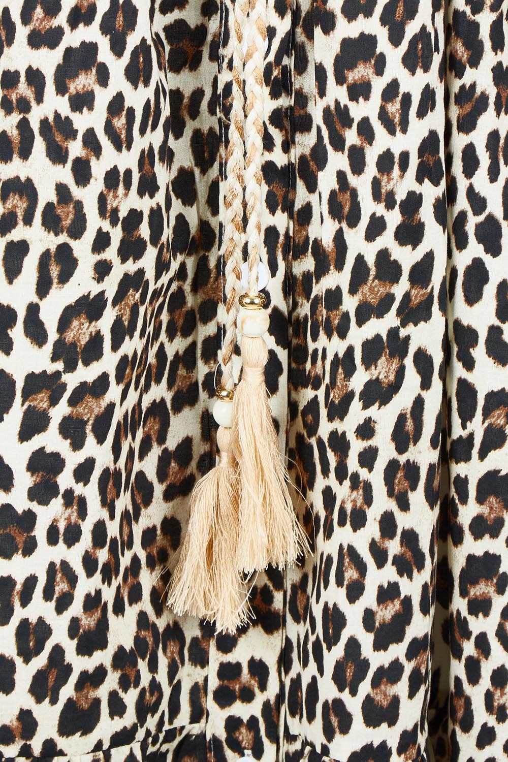 Product shot of the Le Marais Cotton Dress in colour Animal, detail