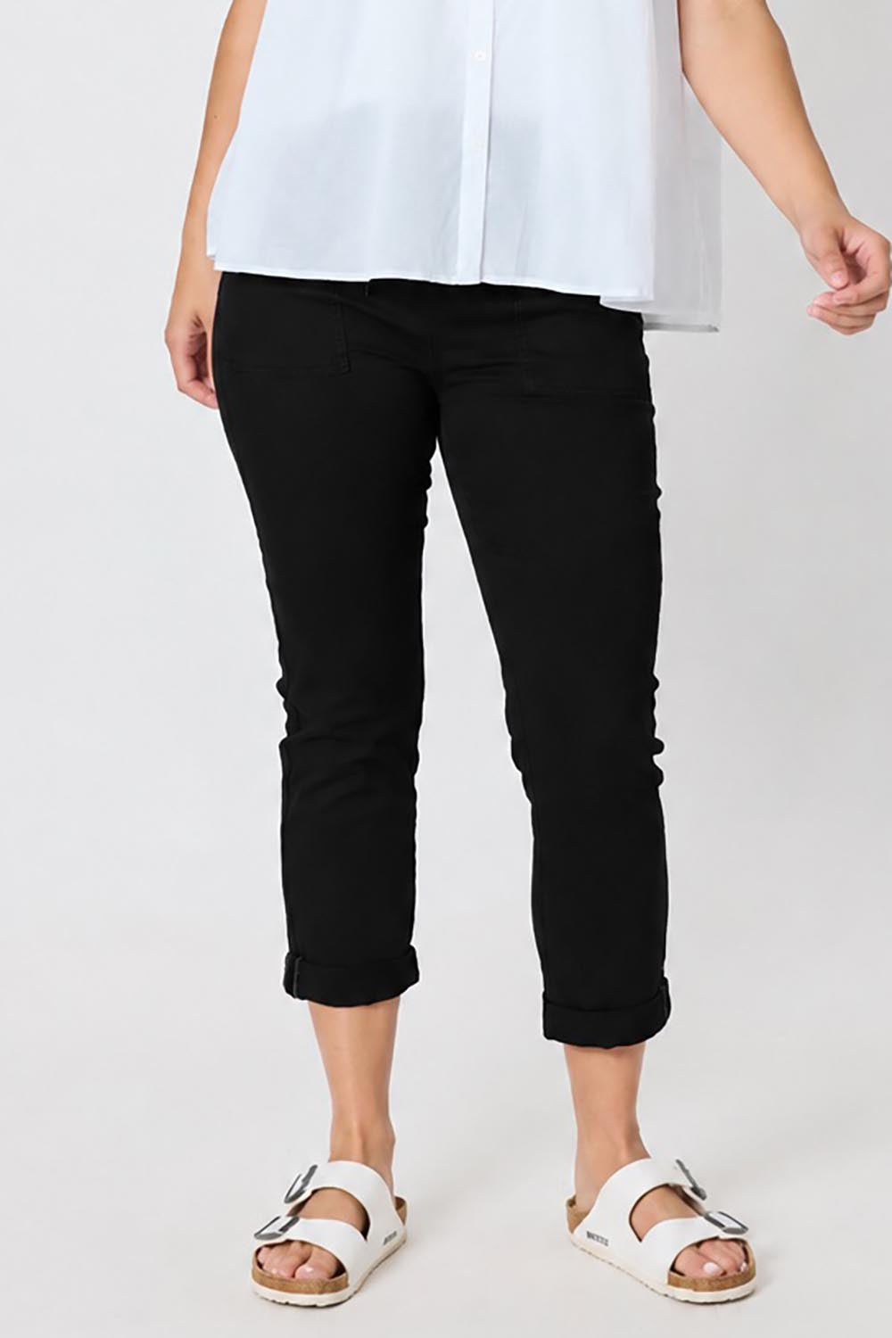 Model Genericm wearing size sample of the Isabella Cotton Pant - Black in colour Black, in a cropped view