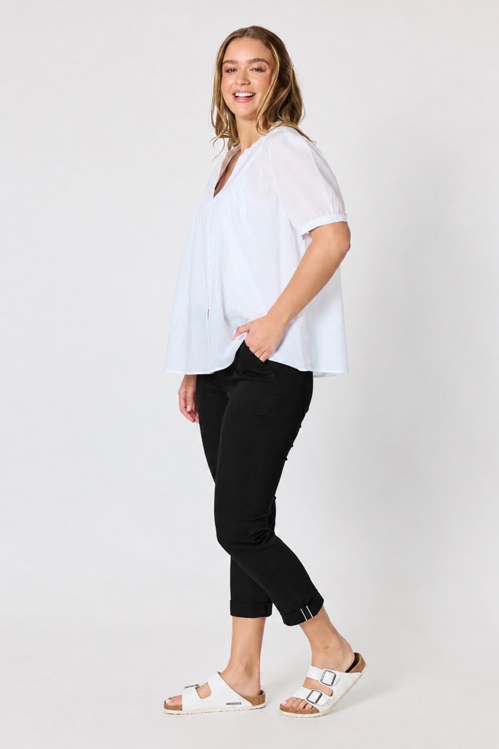 Model Genericm wearing size sample of the Isabella Cotton Pant - Black in colour Black, from the front