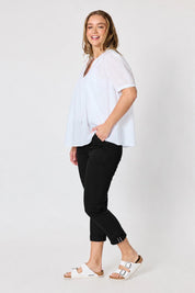 Model Genericm wearing size sample of the Isabella Cotton Pant - Black in colour Black, from the front