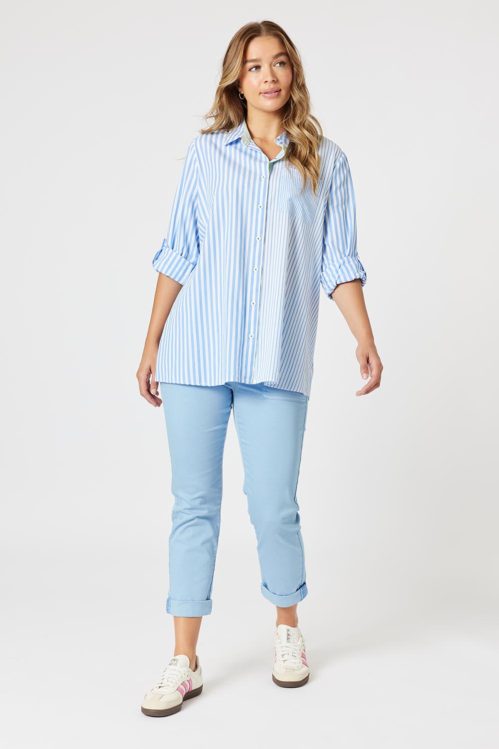 A model wearing the Isabella Cotton Pant in colour Blue (Blue), from the front, showing the whole outfit