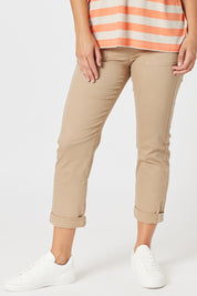 A model wearing the Isabella Cotton Pant in colour Nutmeg, from the front, cropped image