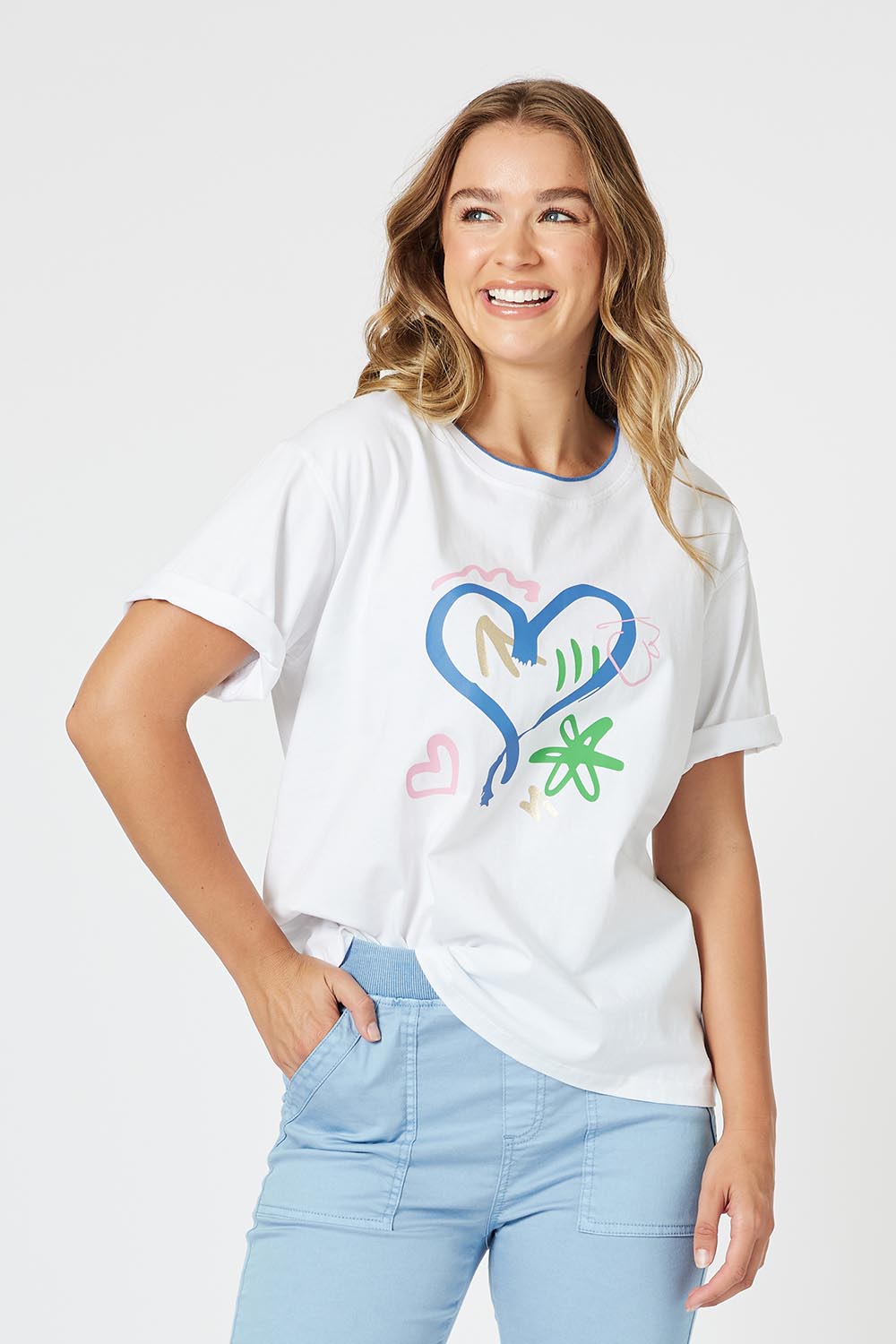 A model wearing the Heart Printed Cotton Tee in colour White (White), from the front, cropped image