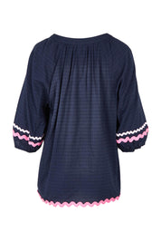 Product shot of the Ric Rac Cotton Top in colour Navy (Blue), from the back