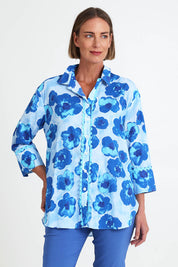 Model Riinar wearing size 10 of the Poppies Shirt – Aqua in colour Aqua, in a cropped view