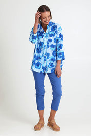 Model Riinar wearing size 10 of the Poppies Shirt – Aqua in colour Aqua, from the front