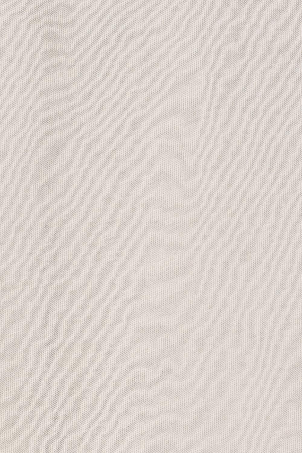 Product shot of the Heart Square Tee in colour Natural, detail
