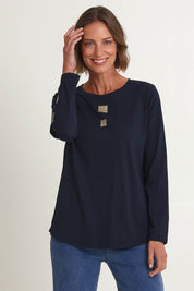 Model Riina wearing size S of the Heart Square Tee in colour Navy (Blue), from the front, cropped image