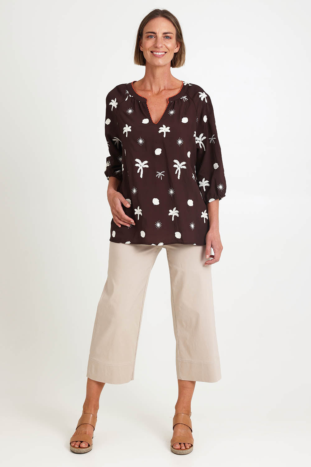 Model Riinar wearing size 10 of the Canopy Embroidered Top – Coffee in colour Coffee, from the front