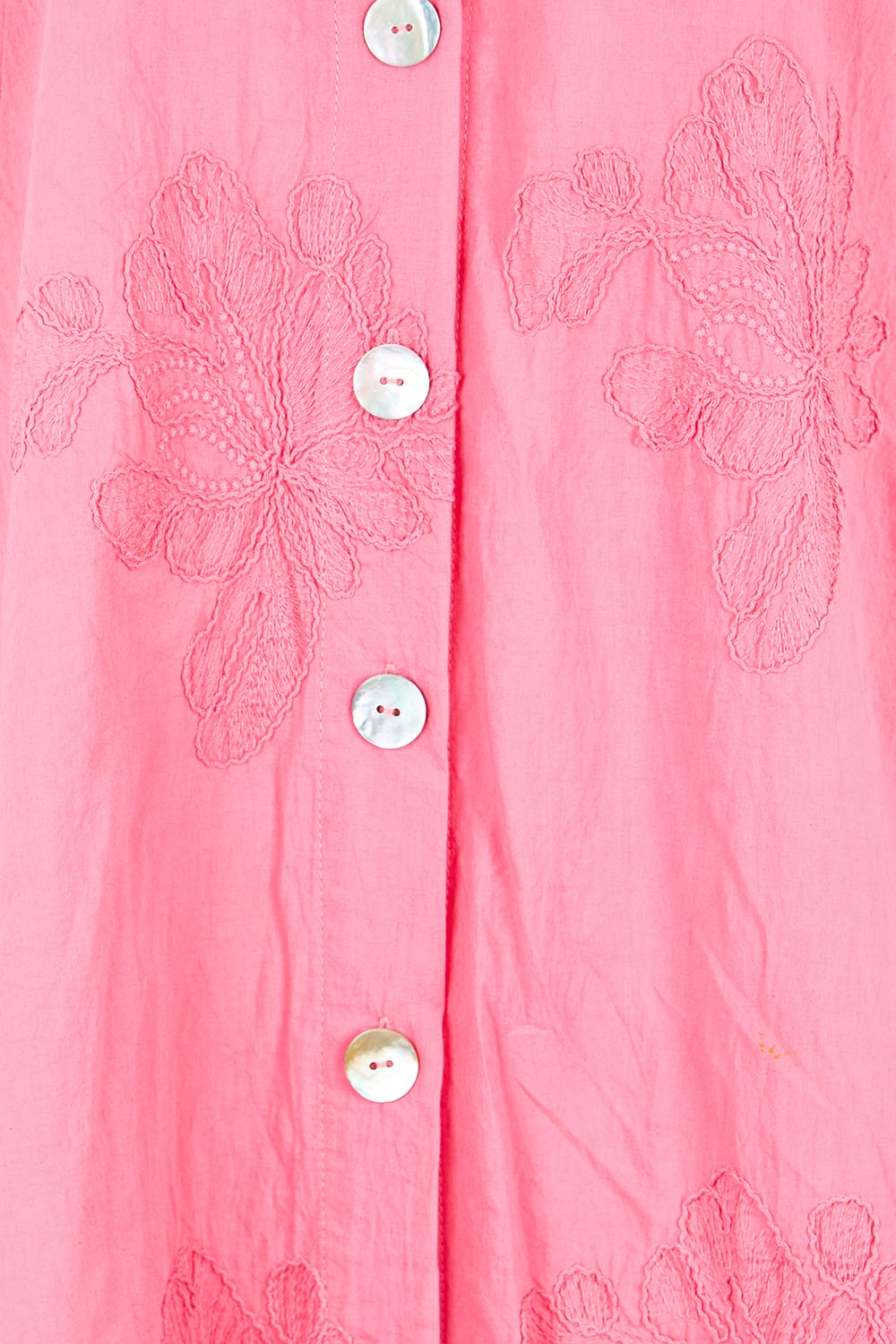Product shot of the Lagoon Palm Shirt – Raspberry in colour Raspberry, showing detail
