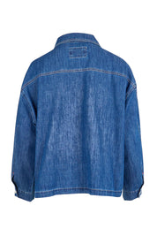 Product shot of the Coast Crop Denim Jacket – Denim in colour Denim, from the back
