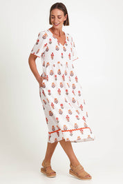 Model Riinar wearing size 10 of the Candelabra Flower Dress – Natural in colour Natural, from the front