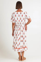 Model Riinar wearing size 10 of the Candelabra Flower Dress – Natural in colour Natural, from the front