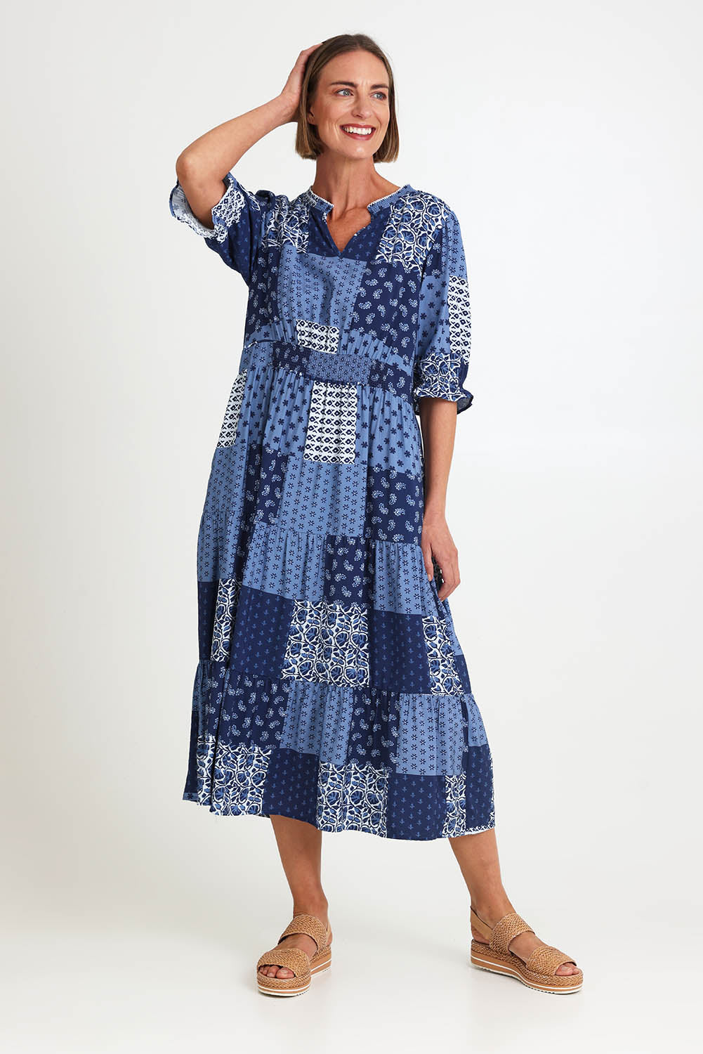 Model Riinar wearing size 10 of the Costa Mesa Print Dress – Navy in colour Navy, from the front
