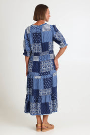 Model Riinar wearing size 10 of the Costa Mesa Print Dress – Navy in colour Navy, from the front