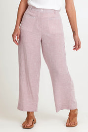 Model Riinar wearing size 10 of the City Stripe Pant - Redwhite in colour Redwhite, from the front